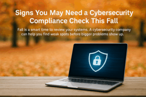 Cybersecurity compliance concept shown with a modern laptop on a desk, set against an autumn-themed background — ideal visual for New York businesses preparing for fall security audits in Hudson Valley, Albany, Dutchess County, and Orange County